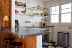 Updated kitchen in the cabin with modern touches and vintage charm
